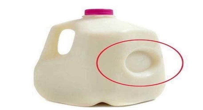 The Surprising Reason for That Tiny Milk Jug Dent