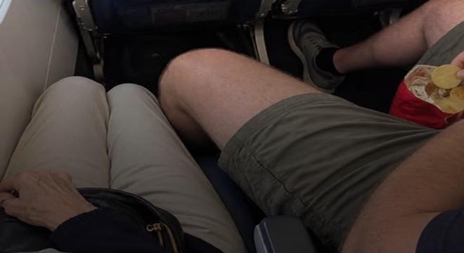 A man spent hours invading my airplane seat, stealing my comfort as if I had no right to complain.